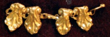 Eléments de collier en or