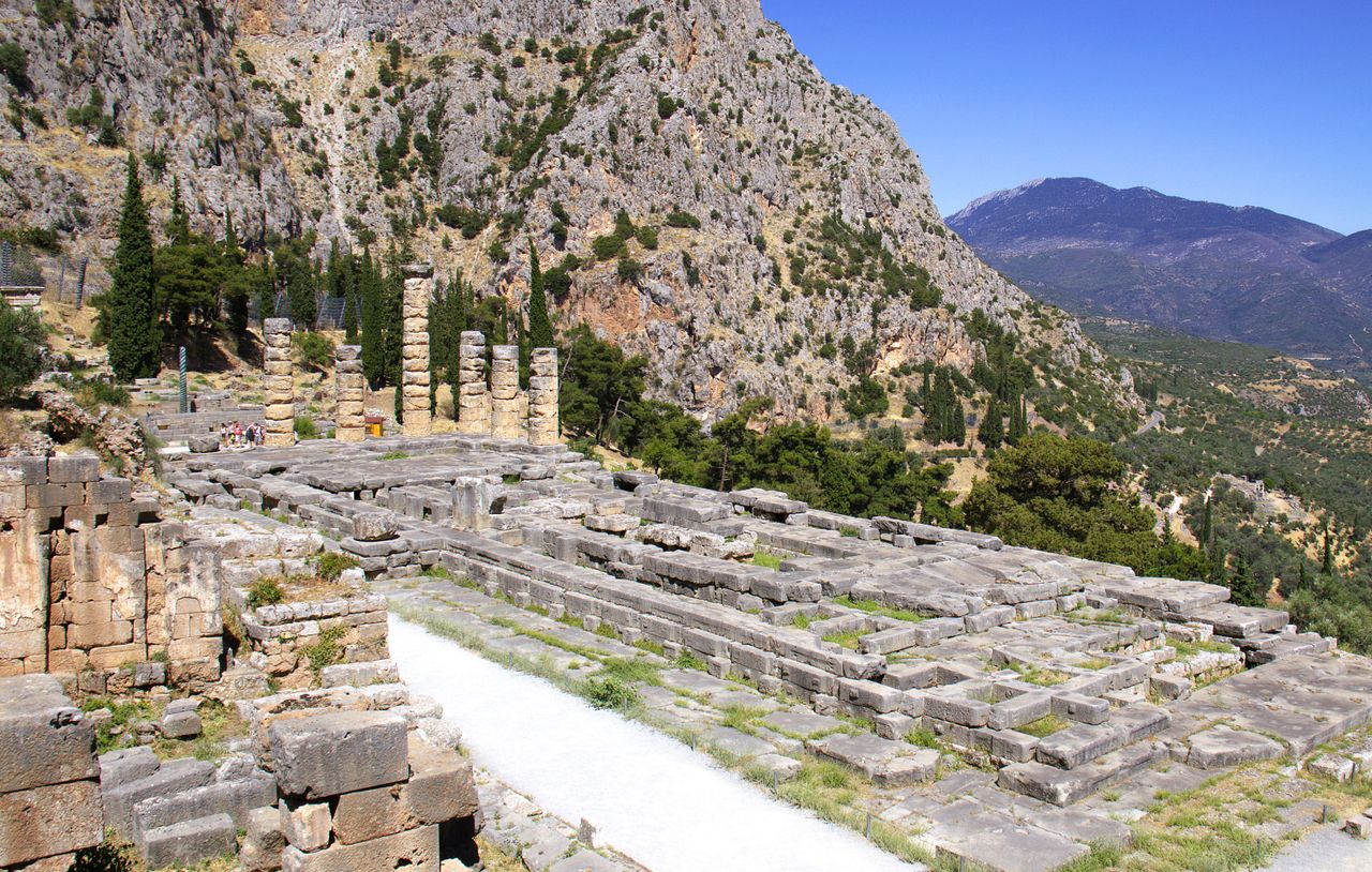 Explore the majestic ruins of Delphi's Temple of Apollo, a UNESCO World Heritage Site.